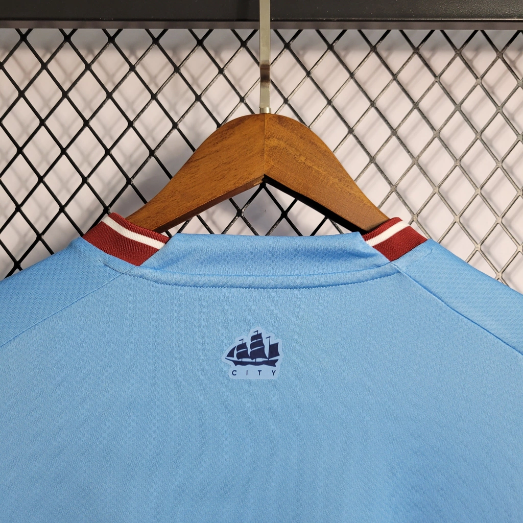Camisa do Manchester City Manga Longa 2022-2023 Camisa do Manchester City Manga Longa 2022-2023