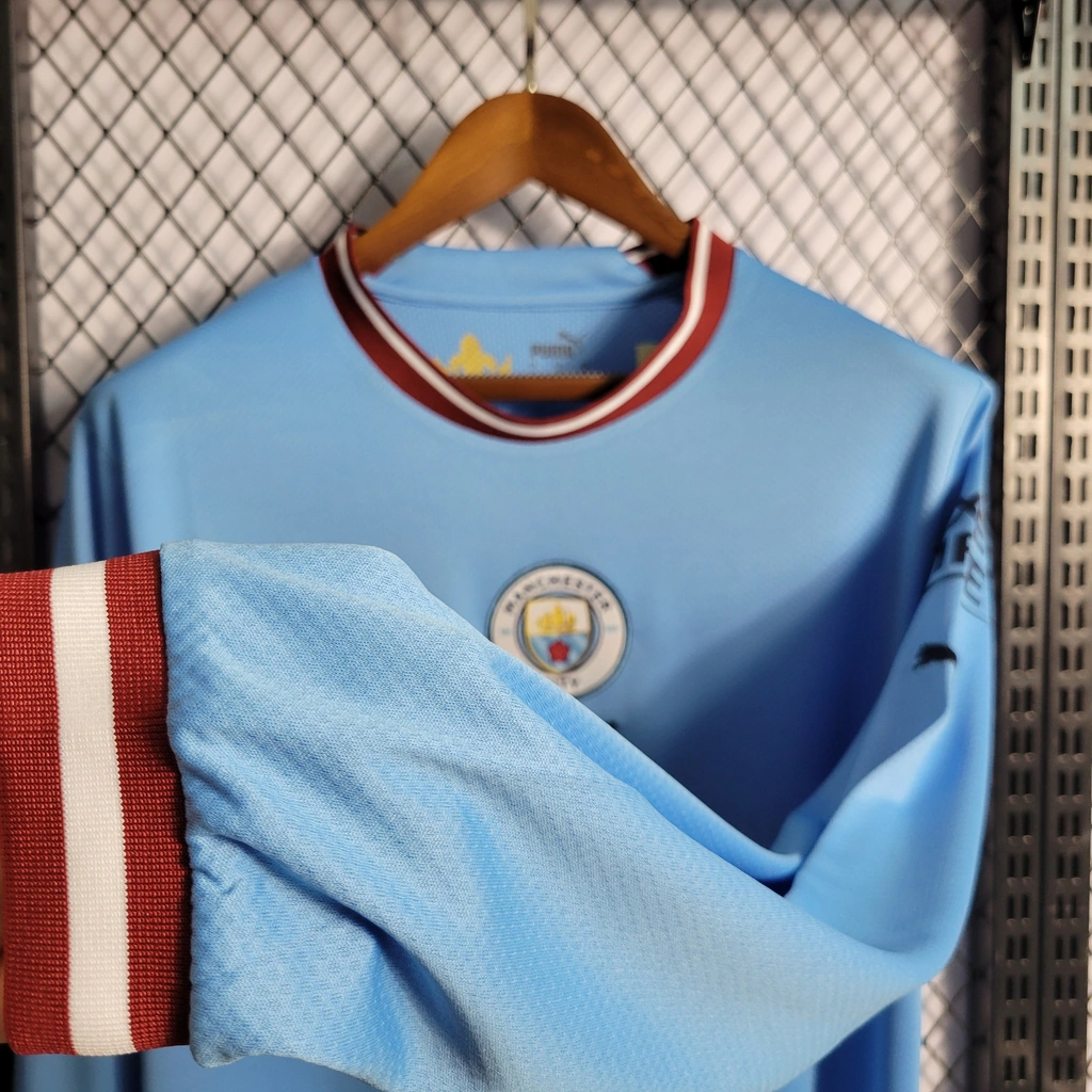 Camisa do Manchester City Manga Longa 2022-2023 Camisa do Manchester City Manga Longa 2022-2023