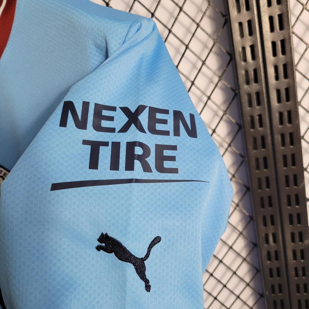 Camisa do Manchester City Manga Longa 2022-2023 Camisa do Manchester City Manga Longa 2022-2023